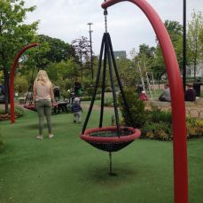 The playground with soft synthetic grass