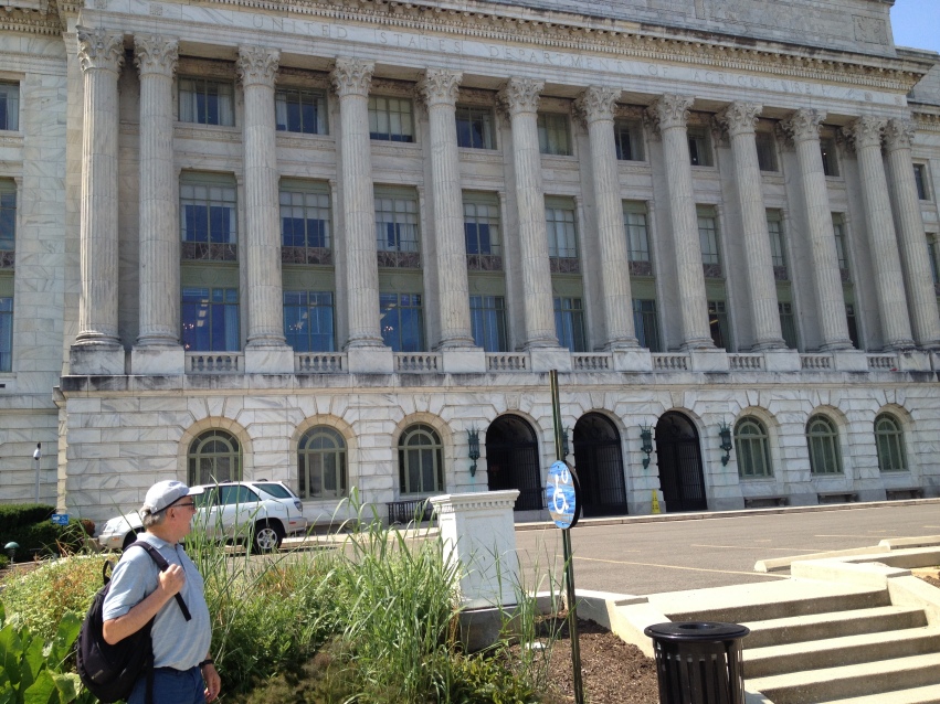 Henry, a scientist in pig nutrition, looking at The Department of Agriculture in Washington, D.C.