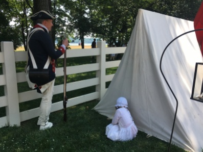 A soldier and his child acting as Washington's Army at Mount Vermont