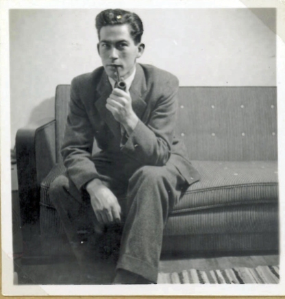 My mother's brother at my parents' double bed and sofa at about 1950
