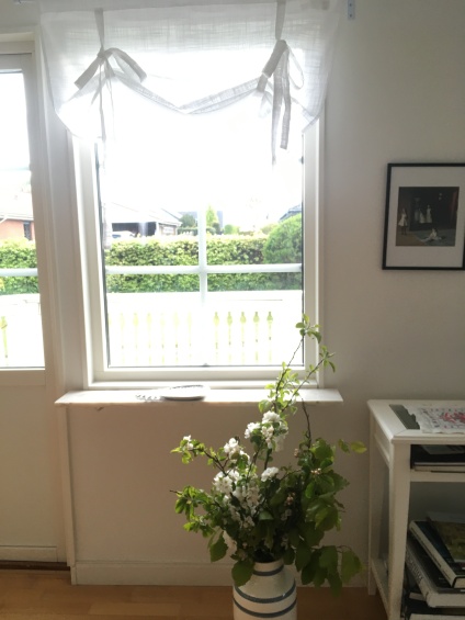 Newly painted walls, new curtains and apple blossom